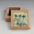 Floral lidded box by Dorothy Watson